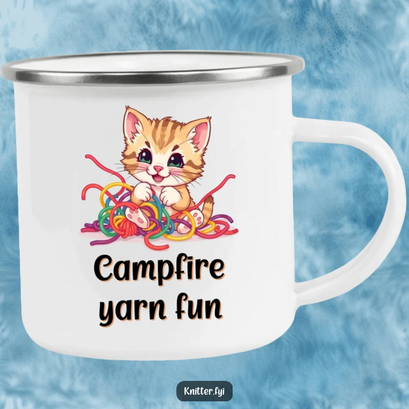 Funny kitten yarn camping mug, showing a playful kitten tangled in yarn in a natural setting, durable and amusing.