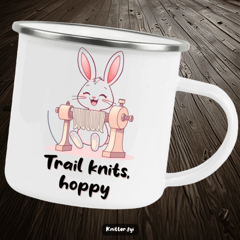 Funny bunny camping mug with a happy rabbit grinning while operating a knitting machine, perfect for camp crafts.