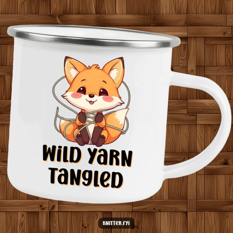 Funny Fox Camping Mug showing a playful fox character smiling while tangled in a web of colorful yarn, great for outdoors.