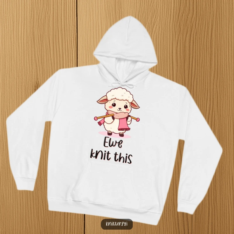 Funny fluffy sheep hoodie, engrossed in knitting a scarf with oversized needles, offering warmth and humorous charm.