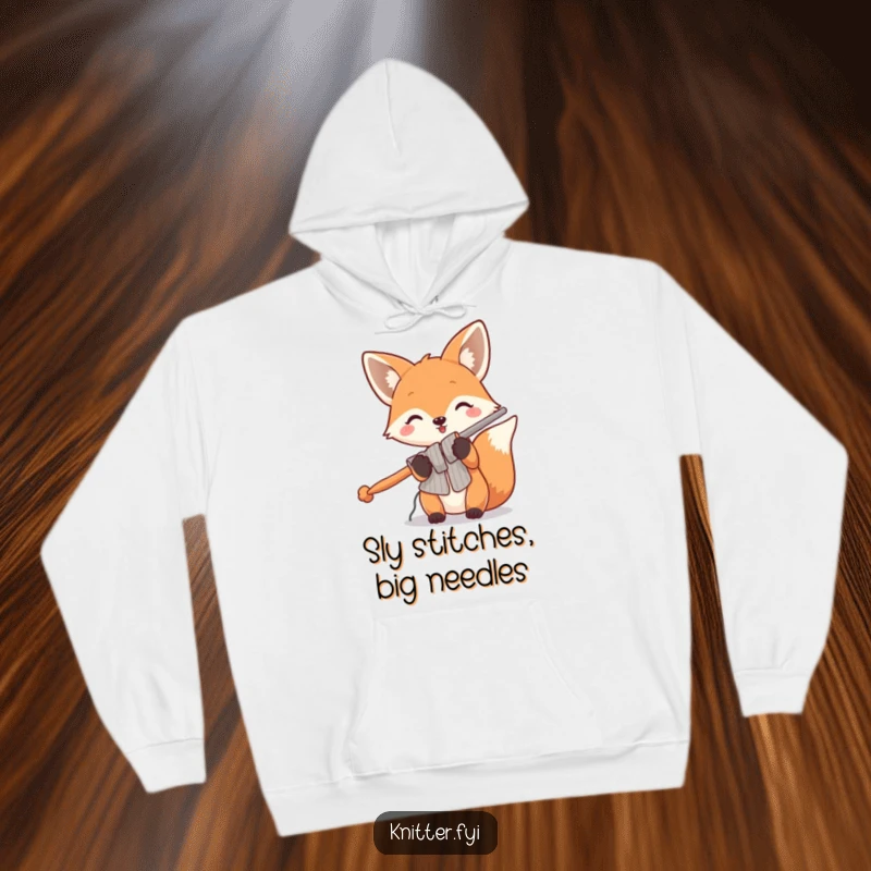 Funny fox hoodie showing a playful fox with enormous knitting needles, ready for big crafting adventures in comfort.