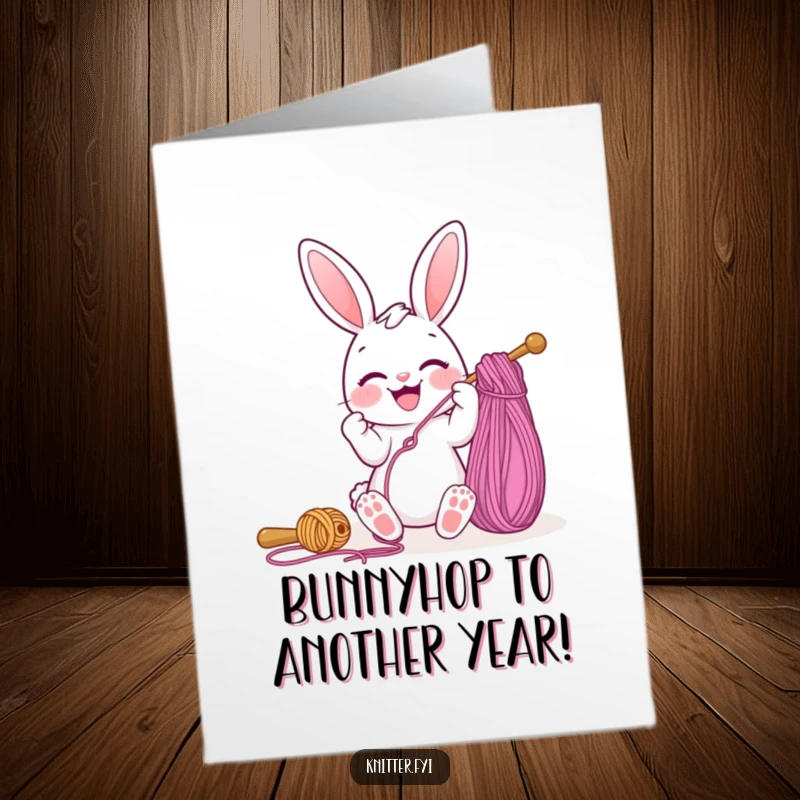 Funny Free Printable Bunny Birthday Card: A joyful bunny happily threads a giant needle with colorful yarn, ready for celebration.