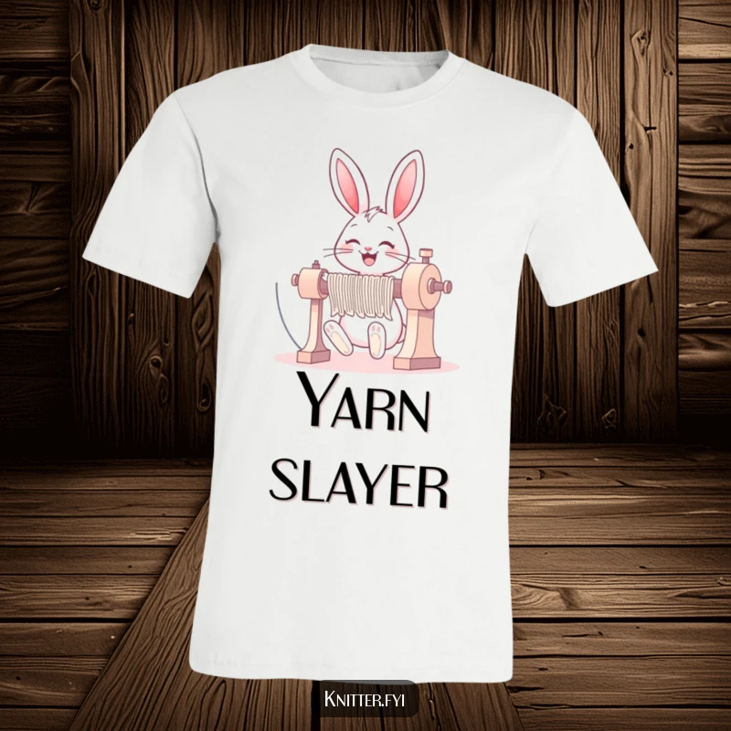 Funny bunny t-shirt featuring a cheerful rabbit operating a large knitting machine with a wide, happy grin.