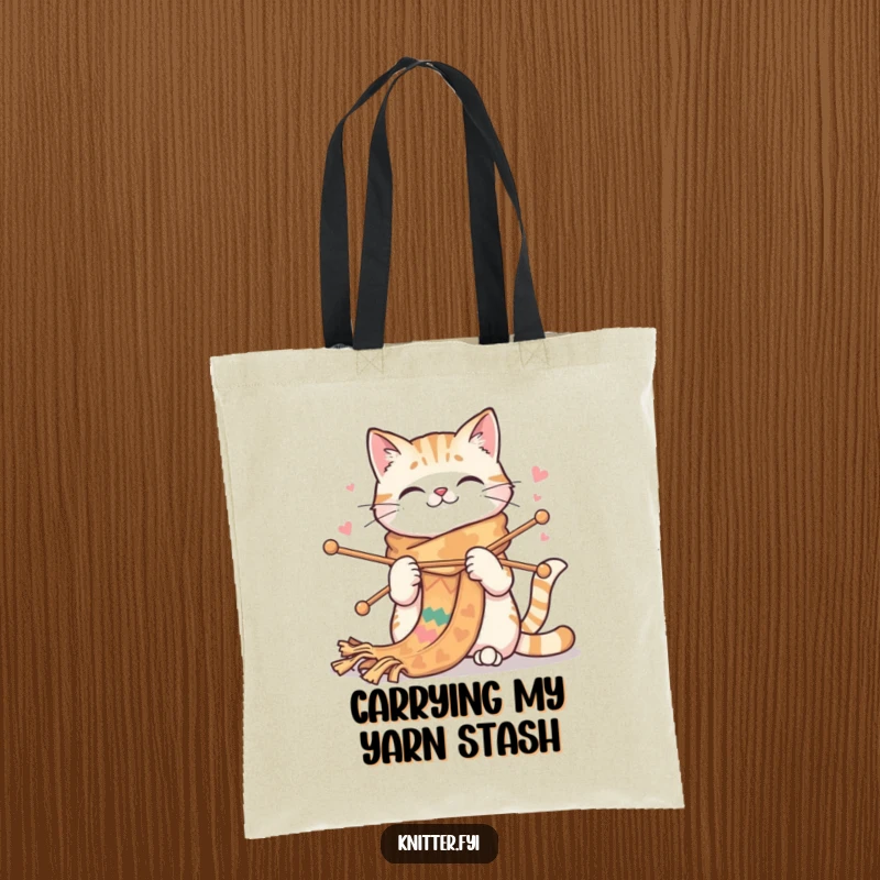 Funny cat tote bag featuring a happy cat with large needles knitting a very long, colorful scarf. Great for crafters.
