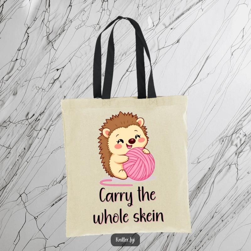 Funny tote bag featuring a happy hedgehog rolling a ball of fuzzy pink yarn. A practical and humorous accessory for crafters, perfect funny gift.